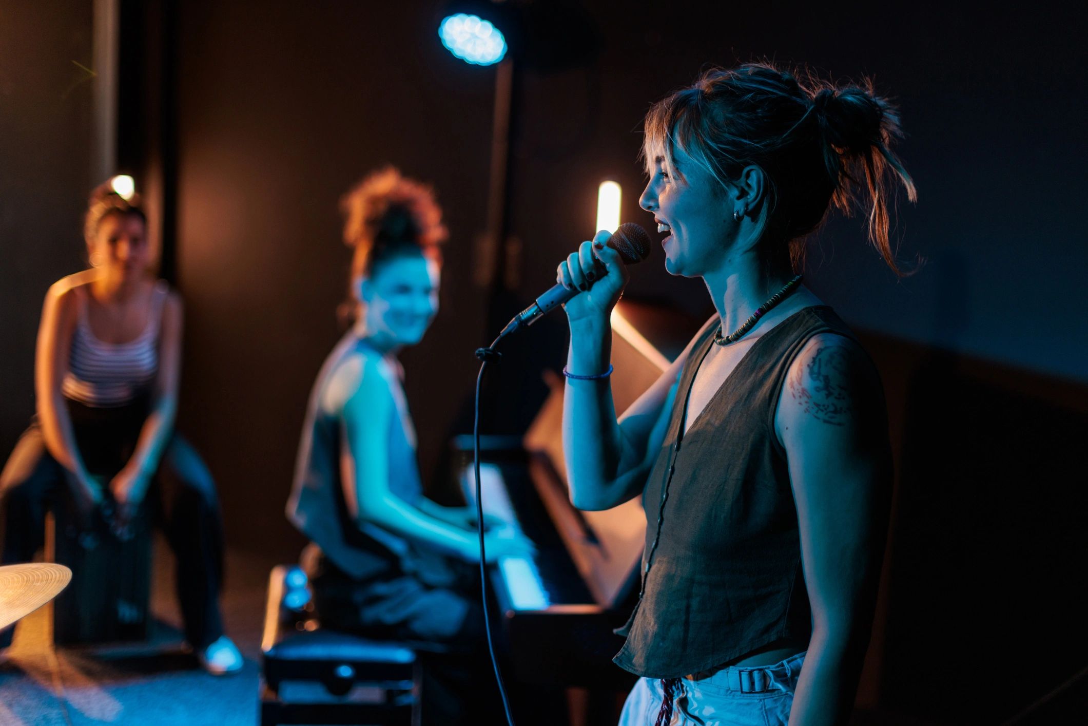 diverse emerging artists singing on stage